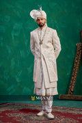 Latest 2026 Groom Sherwani in White Color That Complements Red, Maroon, Rani Pink Bridal Lehenga