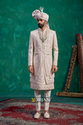 Latest Designer Ivory Layered Royal Groom Sherwani for 2026 – Featuring Embroidered Belt, Ideal for Red/Maroon/Pink/Rani Bridal Lehenga
